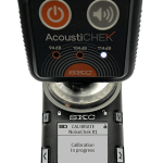 AcoustiCHEK calibrating the SKC NoiseCHEK Dosemeter